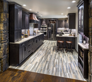 Real copper venthood set atop out custom cabinetry.