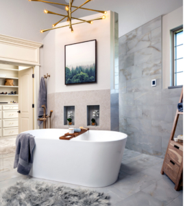 Freestanding tub in front of new walk-in shower wall.