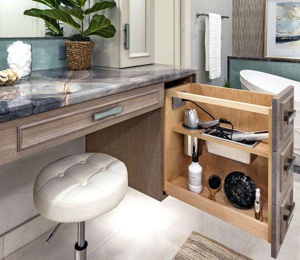 Floating vanity with styling accessory pull-out