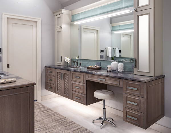 Floating vanity with integrated LED lighting and quartzite tops