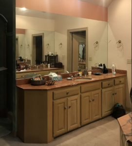 BEFORE his vanity with carpet on the floor