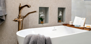 Wall tile detail with niches behind freestanding tub