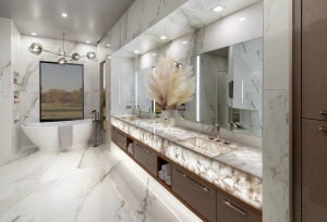 Custom Floating Vanity with 12' wide backlit countertop designed and built for this new home
