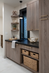 Custom cabinetry installed in this laundry room remodel