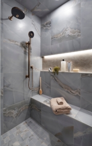 Infinity niche with led lighting installed in this high end shower remodel