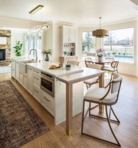 Integrated microwave drawer and farm sink designed into this custom kitchen island