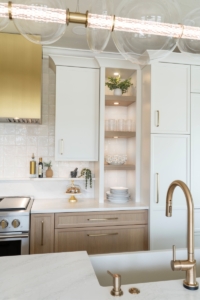 Open shelving integrated into our high end custom cabinetry
