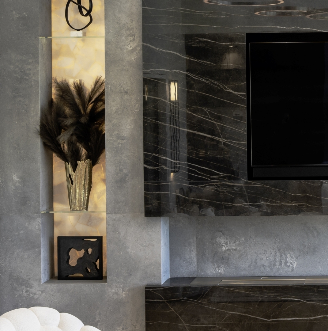 Tile and quartz wrapped TV surround and fireplace