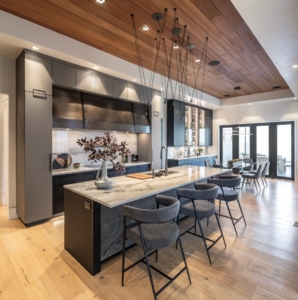 Modern Chefs kitchen with Vibia ceiling lighting