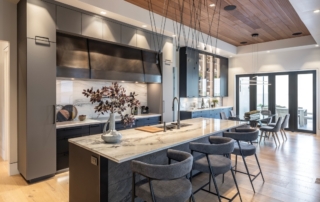 Modern Chefs kitchen with Vibia ceiling lighting