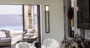 Closeup of modern wall sconce and sliding patio door wall