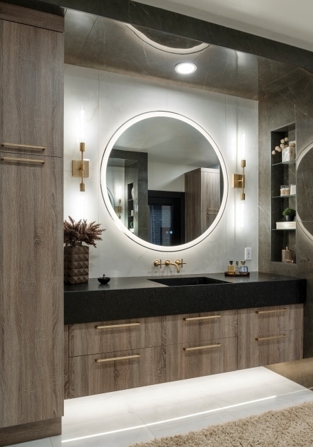 floating vanity with thick counter and round mirror