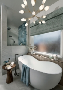 freestanding bathtub with chandelier