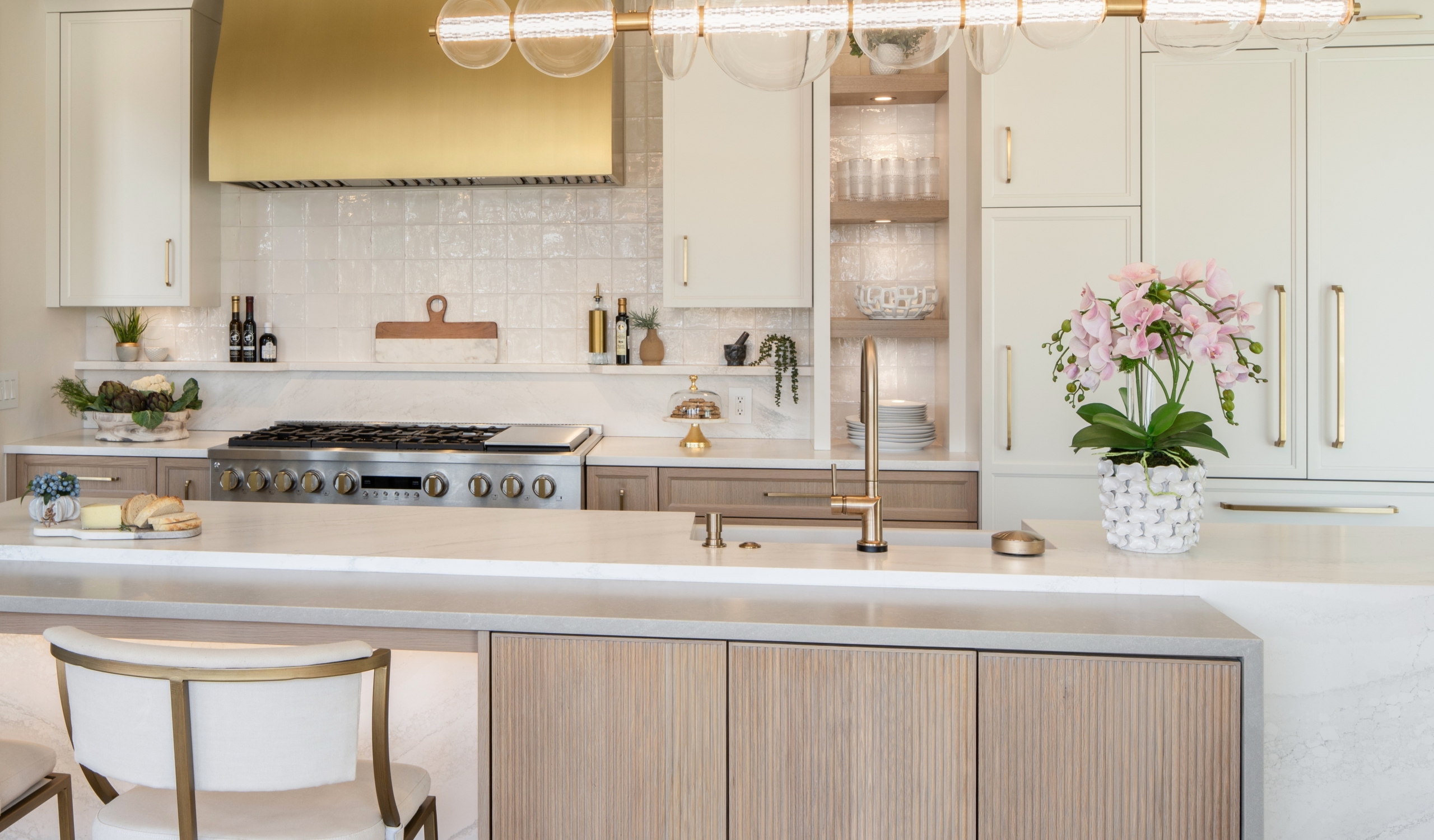 remodeled kitchen with reeded aok and white cabinetry