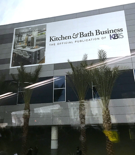 kitchen project on cover of magazine highlighted on the side of the las vegas convention center