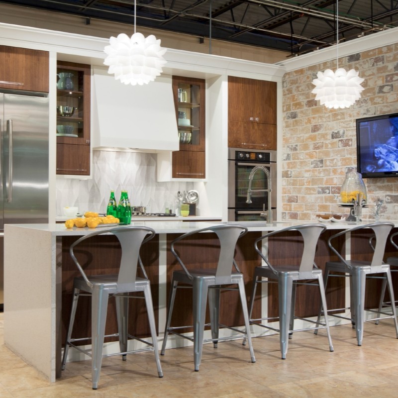 Our grain matched Walnut cabinetry with white borders in our Bosch display inside the Hahn showroom in Oklahoma City