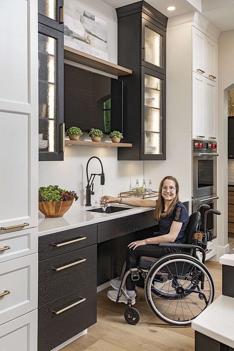 Accessible low bar drop down kitchen countertop designed for wheelchair inclusion and family meal prep by Edmond Kitchen and Bath for this new construction home in OKC