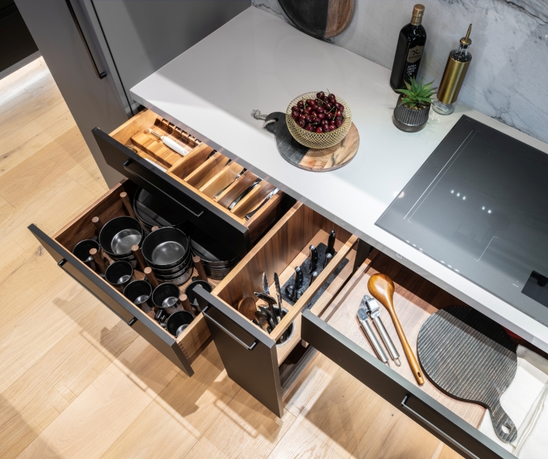 Multiple interior storage systems were created for this new build - and we integrated led lighting in every drawer
