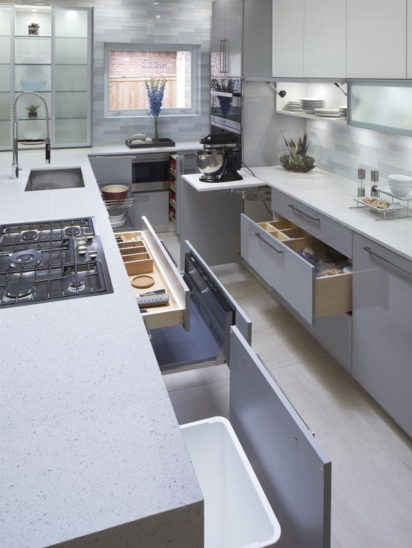 Multiple hidden storage systems included in this Norman kitchen remodel
