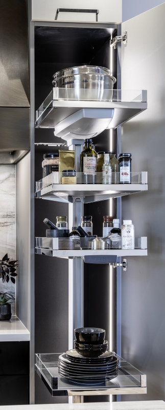 Integrated lighting within the pantry provides illumination where it is needed most