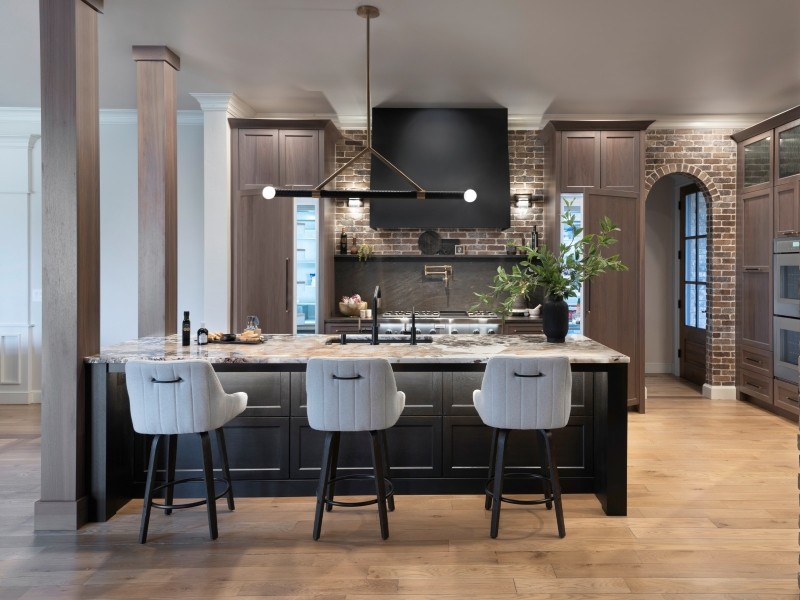 Integrated structural column supporting load-bearing weight after removing a separating wall in an OKC luxury kitchen remodel, designed through our Kitchen Architecture process.