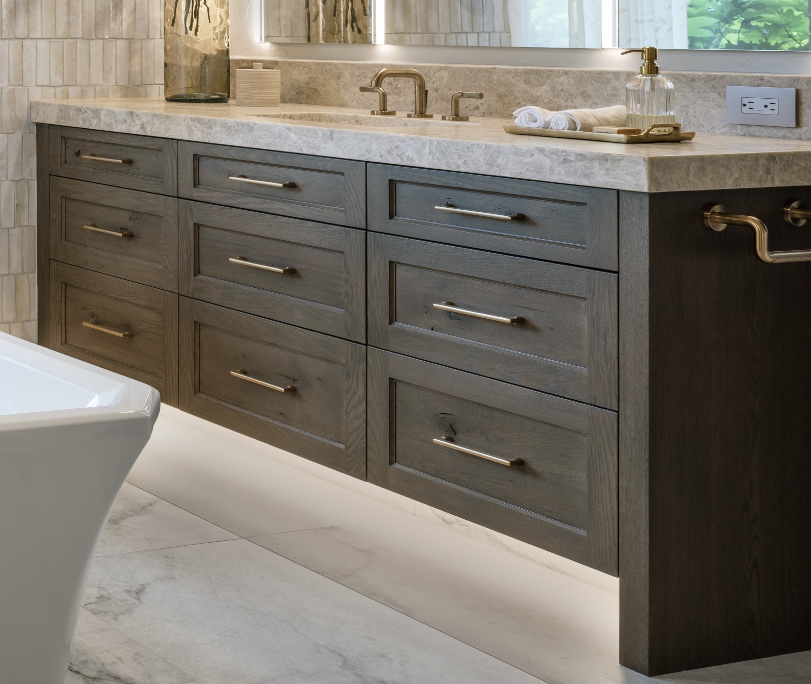 Edmond-bathroom-remodel-custom-knotty-oak-vanity Custom dark-stained rustic oak vanity with quartzite countertop with electric integrated into a hotel ledge