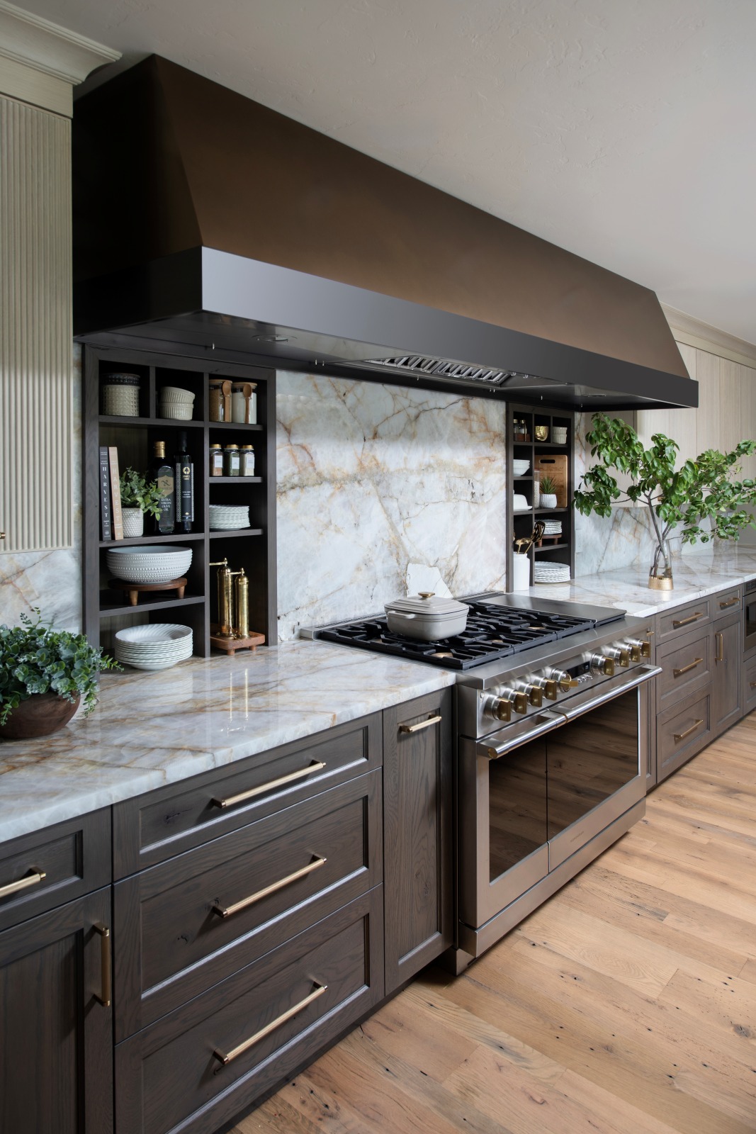 Nine foot long bronze vent hood built for this long kitchen remodel.