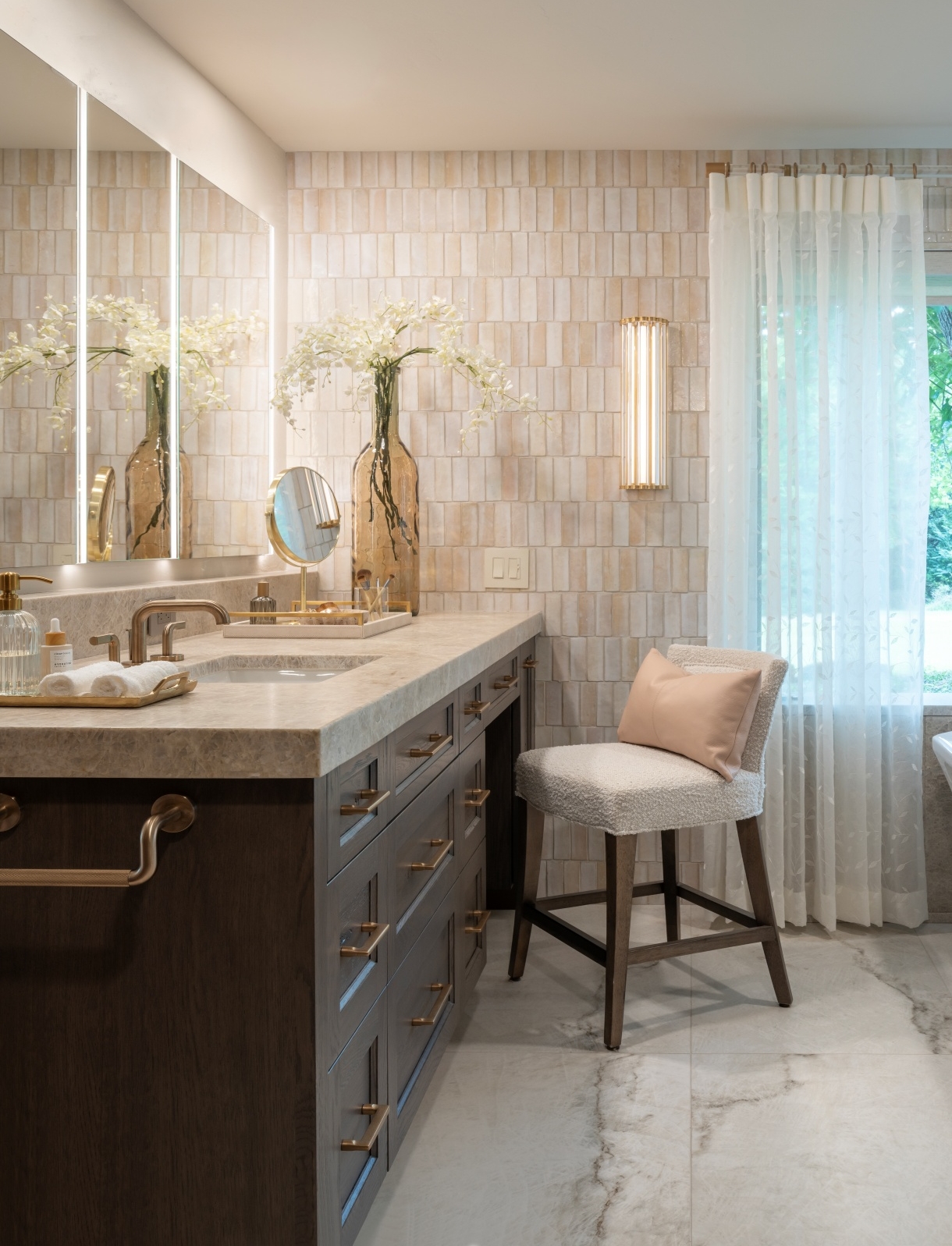Edmond-primary-bath-remodel-her-vanity Custom dark-stained rustic oak vanity with quartzite countertop, gold hardware and edge-lit medicine cabinet