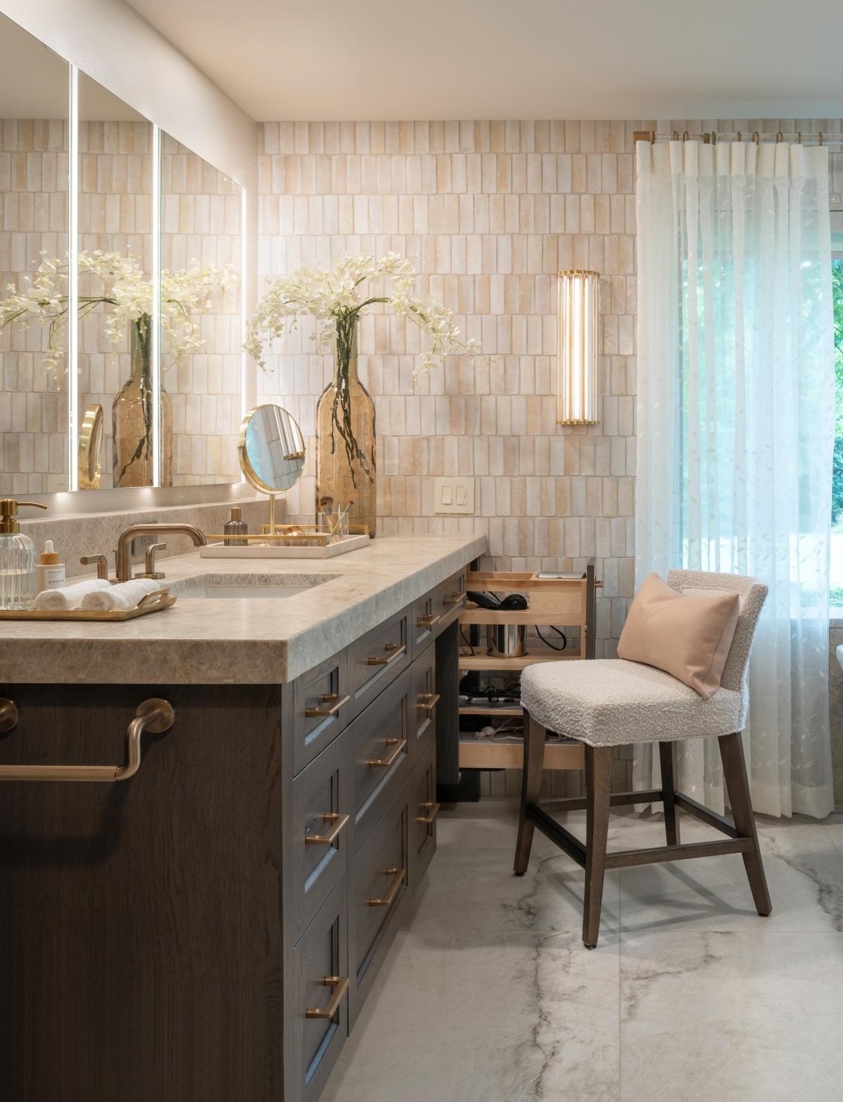Edmond-primary-bath-remodel-her-vanity-pullout Custom makeup vanity with seated knee space and pullout storage for electrical accessories