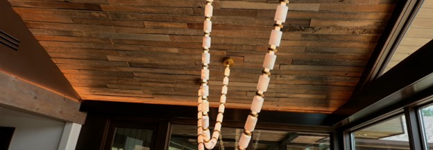 New beams with uplighting were built for this Edmond whole home remodel